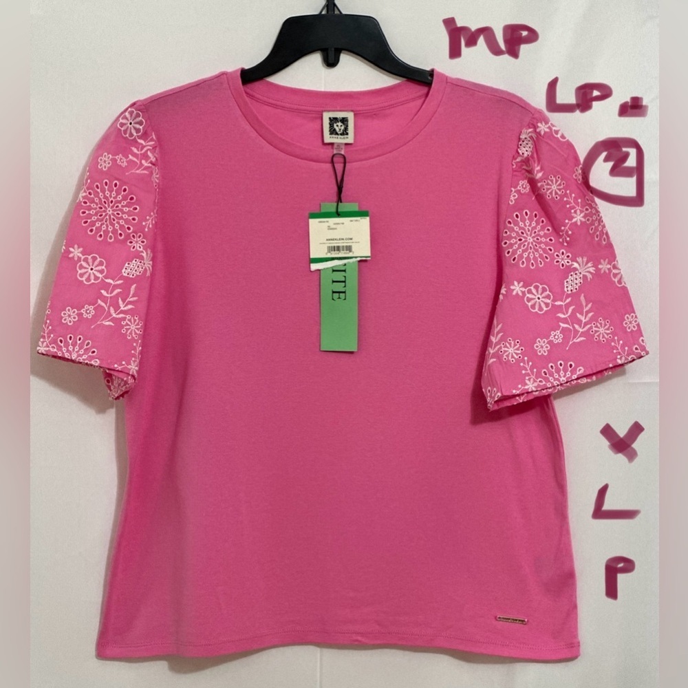 LADIES PINK TOP WITH WHITE FLOWERS ON THE SLEEVES